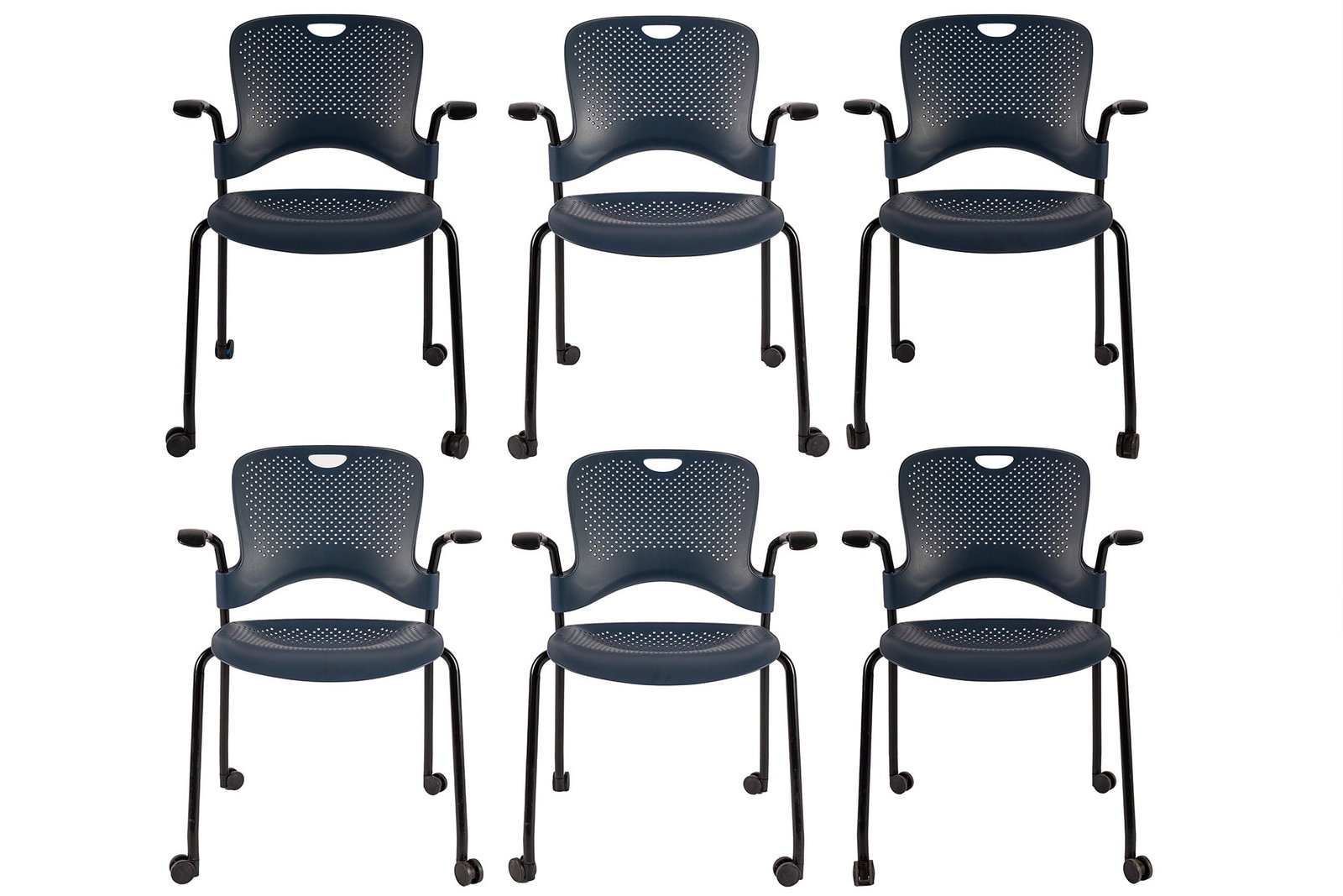 SIX HERMAN MILLER 'CAPER' MULTIPURPOSE CHAIRS: SIX HERMAN MILLER 'CAPER' MULTIPURPOSE CHAIRS 20th century. Set of six (6) stackable navy-blue mesh seat chairs with wheels. 32 1/2 x 20 x 24 in. (82.6 x 50.8 x 61 cm.) Ex Collection of Northland