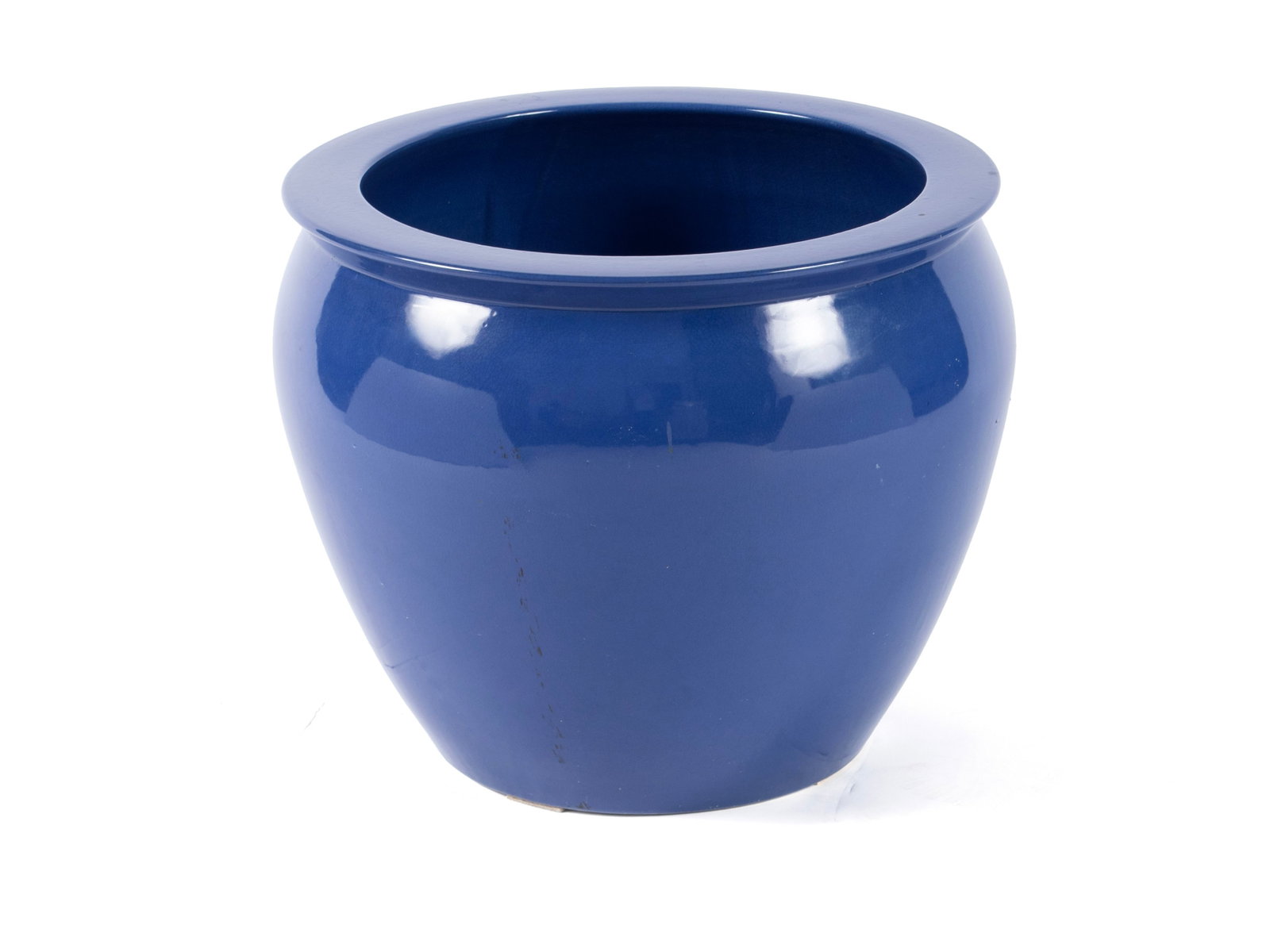 GARDEN JARDINIERE: GARDEN JARDINIERE 20th century. Porcelain jardiniere in dark blue glaze, unmarked. 18 x 22 in. (45.7 x 55.9 cm.)