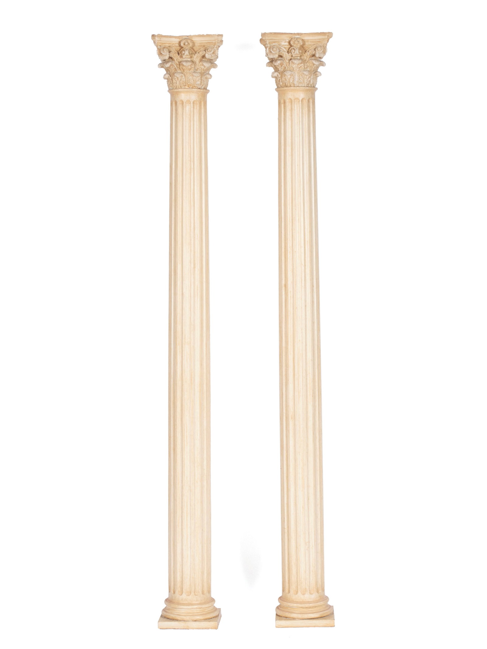TWO ARCHITECTURAL COLUMNS WITH CORINTHIAN CAPITALS: TWO ARCHITECTURAL COLUMNS WITH CORINTHIAN CAPITALS 20th century, wood and plaster. Full fluted columns with creme colored finish throughout, showing foliate Corinthian capitals. 80 x 9 1/2 in. (203.2
