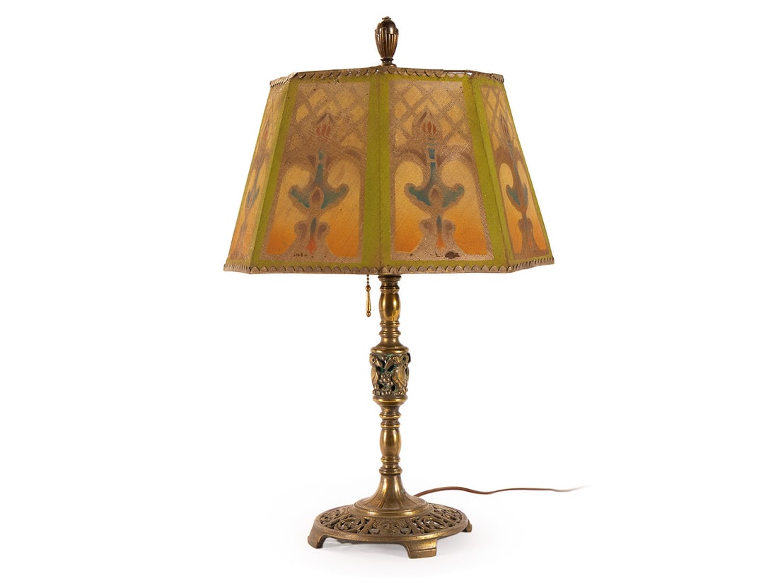 OSCAR BACH TABLE LAMP BASE WITH MESH SHADE: OSCAR BACH TABLE LAMP BASE WITH MESH SHADE American (New York), early 20th century, signed to metal label on bottom. Octagonal metal screen shade with Art Deco decoration, on the bronze standard with