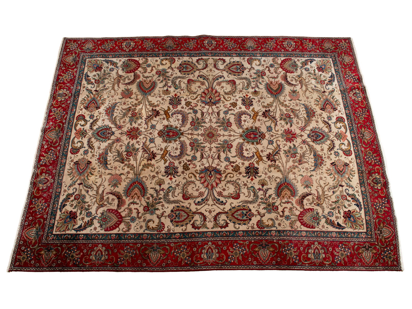 SAROUK ROOM RUG: SAROUK ROOM RUG Persian, 20th century. Colorful scrolling foliate vines cover the beige field showing a forest green outer border, wide red primary outer border. 12 ft. 3 in. x 9 ft. 3 in. (373.4 x