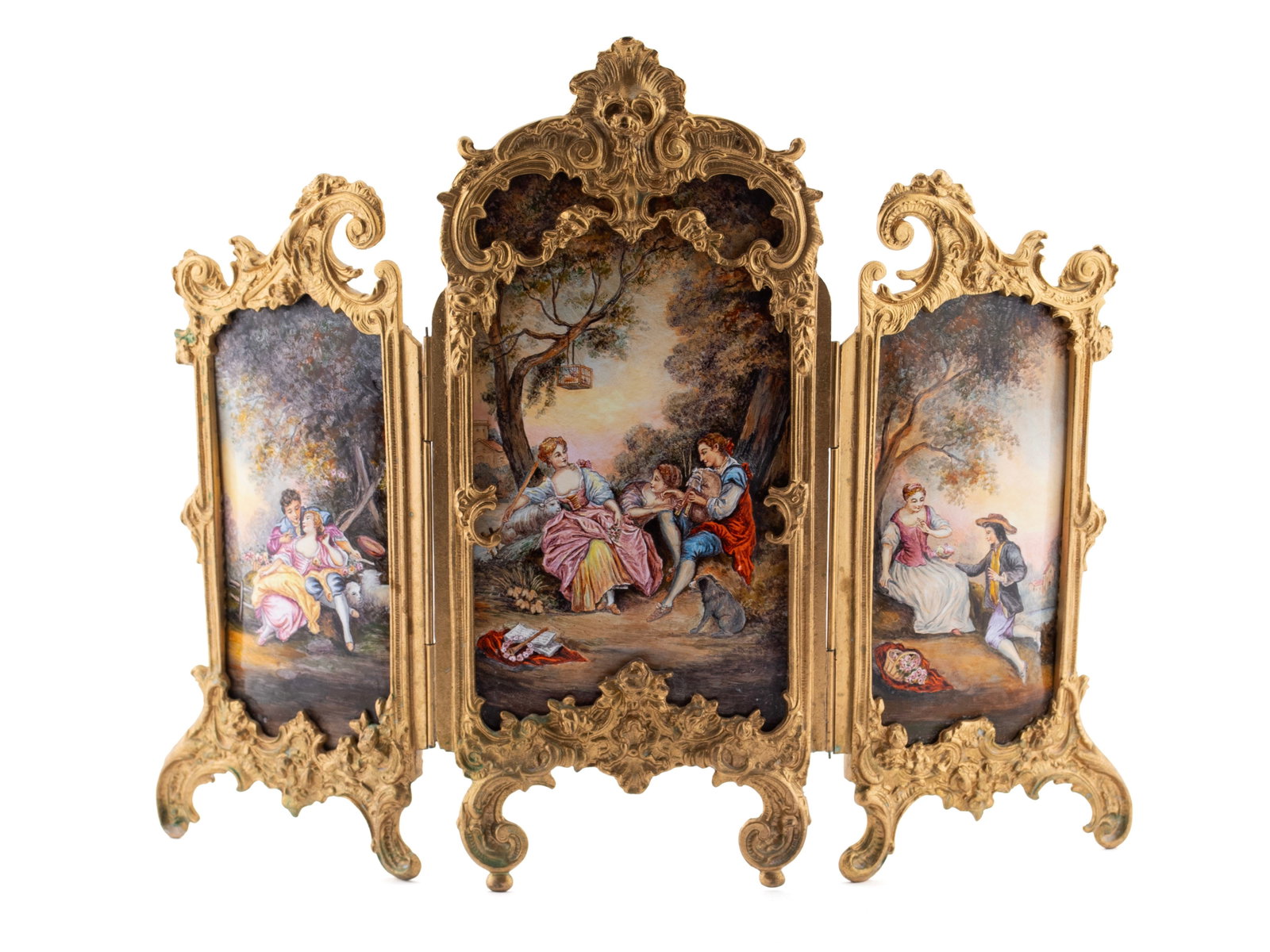 LOUIS XV STYLE ENAMEL TABLE SCREEN: LOUIS XV STYLE ENAMEL TABLE SCREEN Continental, circa 1900, enamel with bronze mount. Three colorful enamel panels painted with amorous garden scenes; all mounted in an elaborate scrolling and foliate