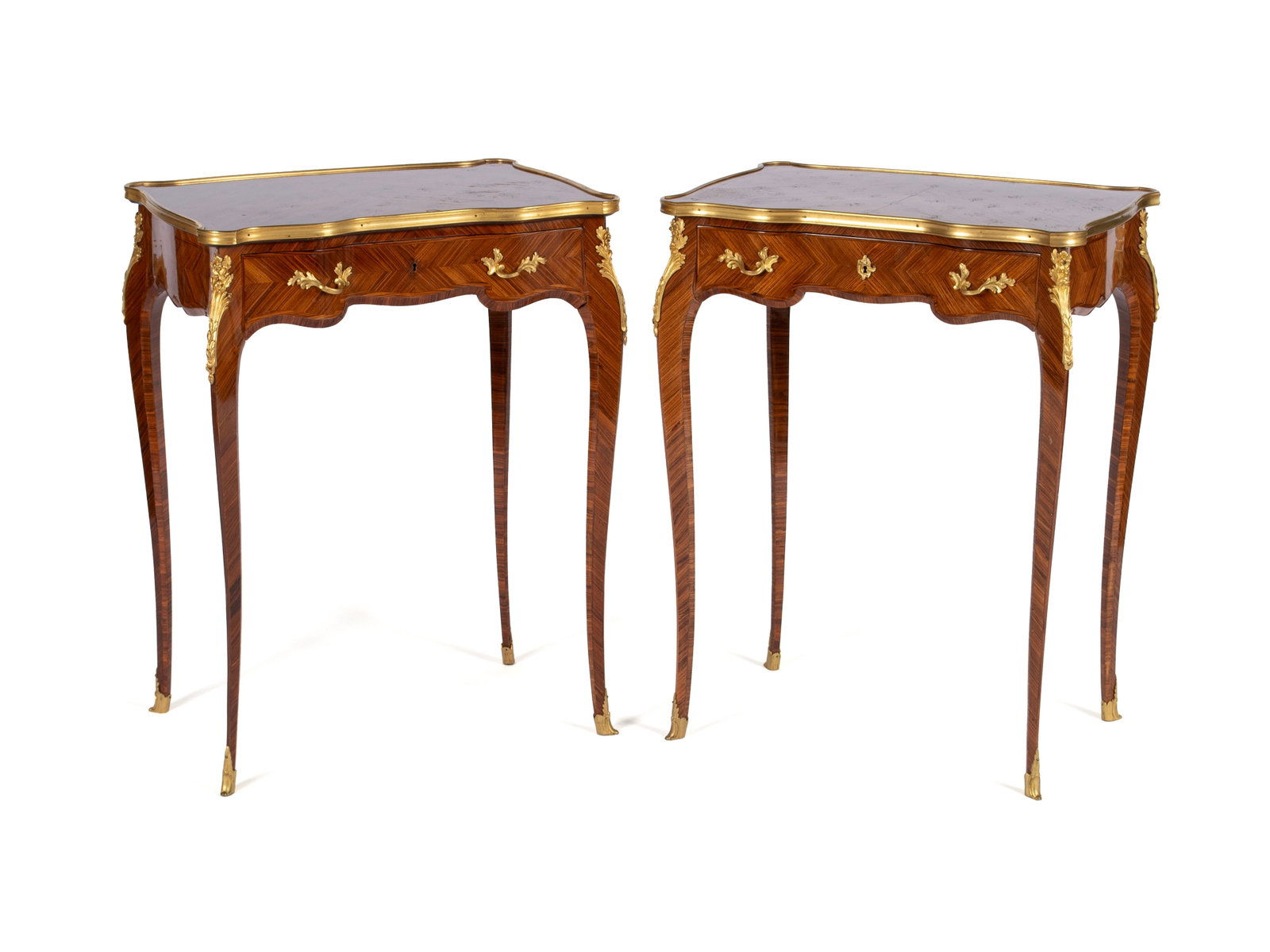 PAIR OF PAUL SORMANI LOUIS XV STYLE SIDE TABLES: PAIR OF PAUL SORMANI LOUIS XV STYLE SIDE TABLES Continental, 20th century, signed on the locks. Floral inlaid highlights with gilt bronze mounts, showing a shaped top, a single frieze drawer, on cabri