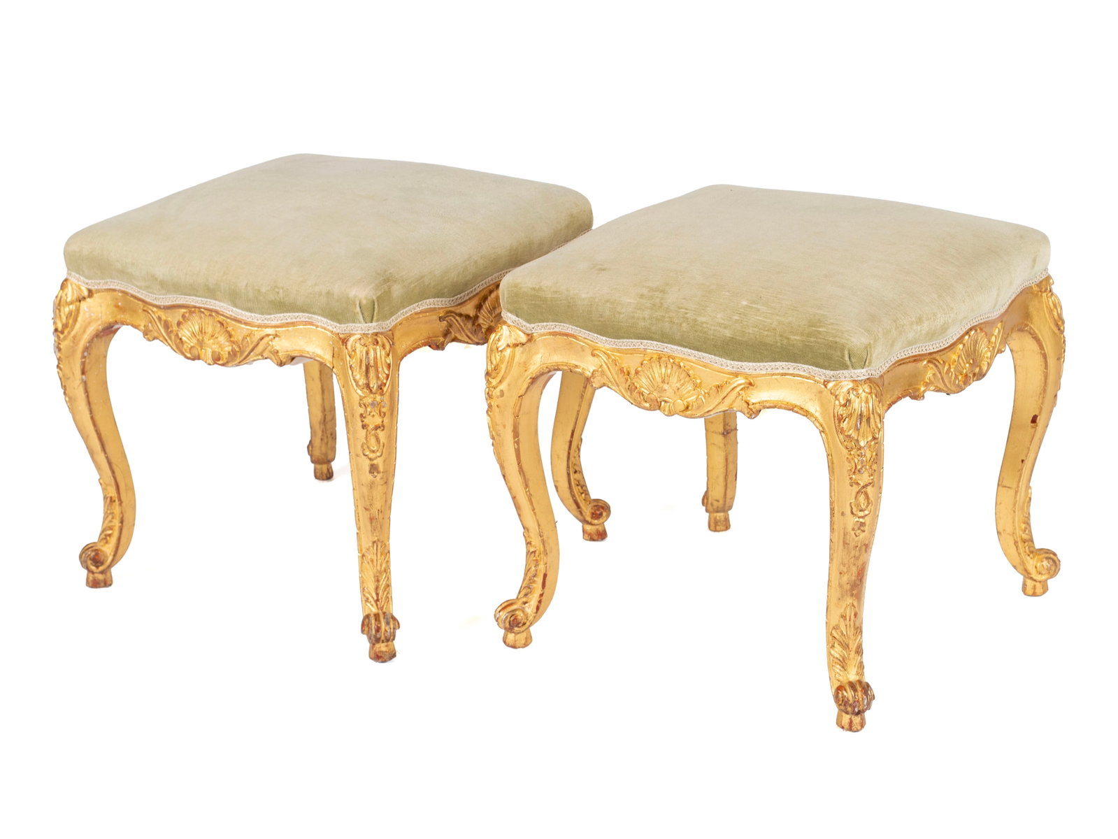 PAIR OF LOUIS XV STYLE GILTWOOD STOOLS: PAIR OF LOUIS XV STYLE GILTWOOD STOOLS Continental, 20th century. Shell and foliate carved frame on cabriole legs and acanthus highlights at the scrolling feet. Each: 18 x 18 1/2 x 18 1/2 in. (45.7 x 