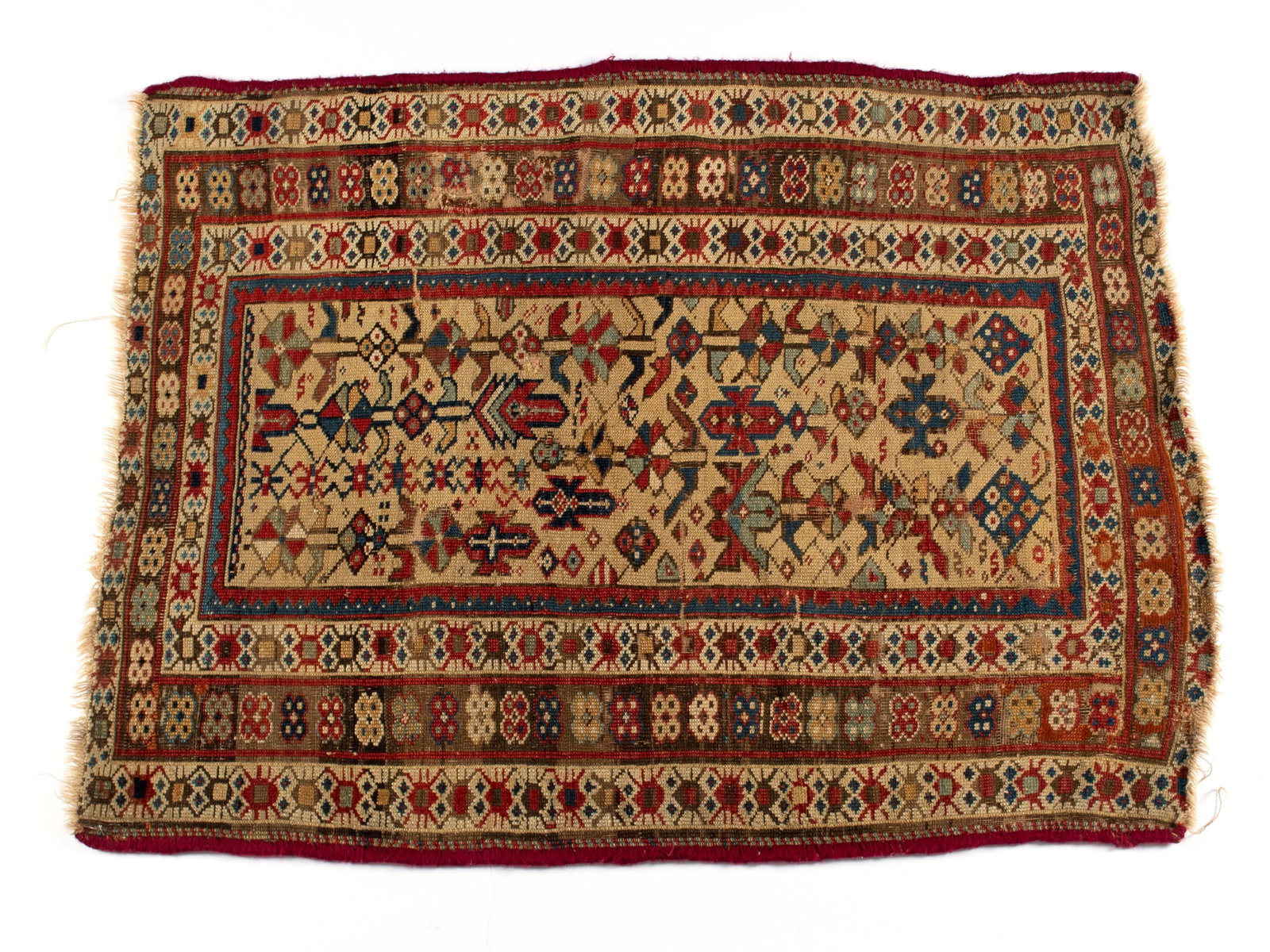 CAUCASIAN AREA RUG: CAUCASIAN AREA RUG Persian, late 19th century. Colorful geometric form to the ivory field, multiple colorful borders decorated with geometric forms. 4 ft. 4 in. x 3 ft. 4 in. (132.1 x 101.6 cm.)