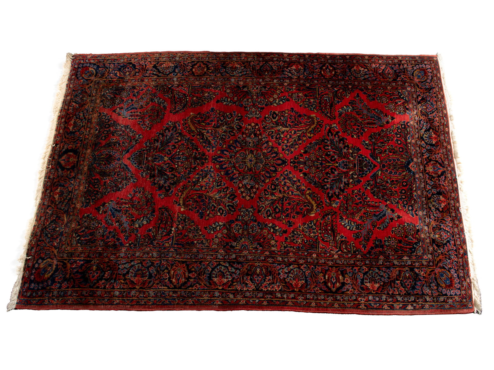 SAROUK HALL RUG: SAROUK HALL RUG Persian, 2nd quarter 20th century. Floral bouquets cover the red field, navy border with multiple guard borders. 9 ft. x 5 ft. 11 in. (274.3 x 180.3 cm.)