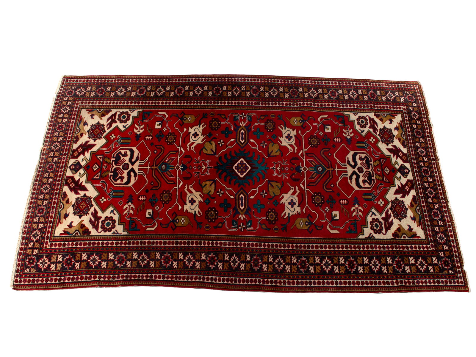 TRIBAL HERIZ HALL RUG: TRIBAL HERIZ HALL RUG Persian, early 20th century. Unique design of birds and foliate medallions in shades of ivory, gold, forest green and navy across the red field showing ivory end panels, navy