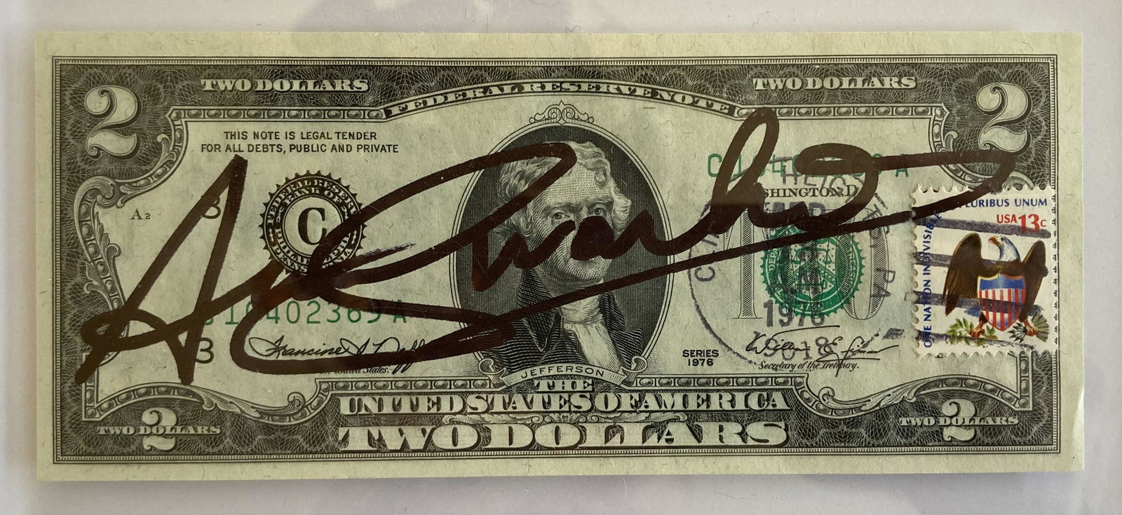 Andy WARHOL (USA, 1928-1987): Banknote of 2 Jefferson Dollars, 1976 signed with an marker on the front "Andy Warhol". "Andy Warhol" stamp on the back.Size: 2 1/2 by 6 in - 6,5 by 15,5 cmPlease refer to the conditions of sale and t