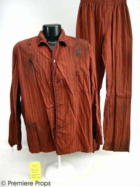 BLACK CHRISTMAS Billy's Villain Costume: BLACK CHRISTMAS - The central villan costume. Billy's (Robert Mann) screenworn Red Impaled Pajamas - Red with black and gold striped pajamas. This costume includes a long-sleeve shirt and pants. This