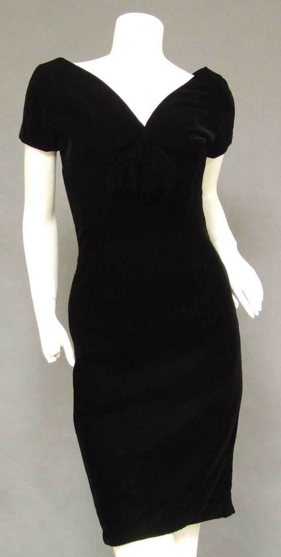 Suzy Perette 1950's Black Velvet Vintage Cocktail Dress: A curvaceous vintage cocktail dress in plush black velvet. Figure flattering vertical seaming. PLUNGING neckline (I think it originally had even more plunge but someone stitched it up just a tad... yo