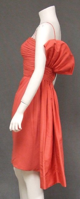 Wilson Folmar Pink Chiffon 1950s 1960s Cocktail Dress: A superb vintage cocktail dress in salmon colored silk chiffon and silk taffeta. Beautifully gathered, fitted bodice with double spaghetti straps. Dress has a fitted, gathered and draped skirt. FABULO