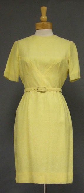 Lemon Yellow 1960's Day Dress: A nice 1960's summer day dress in lemon yellow with a white fleck. Neat lines on the bodice. Matching belt. Lined. Rear metal zipper. Label reads, "Mr. Jack Dallas." Size:37" bust, 27" waist, 38" hips