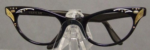 UNWORN 1950s Black Eyeglasses Frames Rhinestones: Unworn, N/OS authentic vintage 1950s 1960s eyeglasses frames. Ebony colored frames with gold and ivory paint, etching, tiny gold studs and rhinestones. Made by Lord in the USA. Size: 44-22 | Approxima