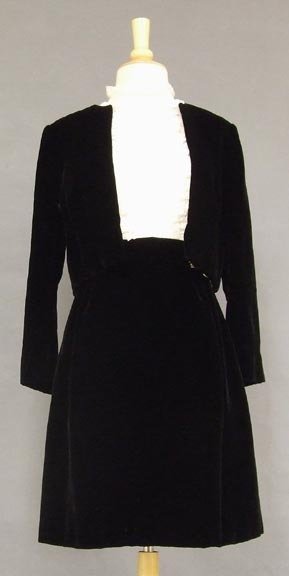 Black Velvet Ivory Lace Shannon Rodgers Cocktail Dress: Vintage 1960s dress. Sleeveless, sheer ivory organdy bodice with embroidery and ruffled lace front. Bodice has a spaghetti strapped ivory crepe liner. Dress has a plush black velvet set-in waist and s