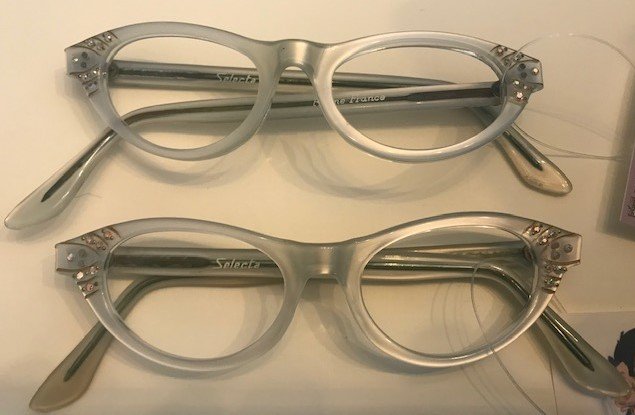 2 Pairs UNWORN White 1950s 1960s Eyeglasses Frames: TWO identical pairs of authentic, unworn 1950s 1960s eyeglasses frames in Velvet Silver (really almost white) Accents: gold etching & AB rhinestones. Made By: Selecta in France Size: 44-20 | 4 3/4" wi