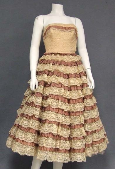 Cotillion Formals Strapless Lace Taffeta 1950s Dress: An incredible 1950s prom dress in a peachy beige lace and mocha taffeta. Strapless, fitted bodice and full, HEAVY skirt with an attached crinoline (shown here with an additional crinoline... not inclu