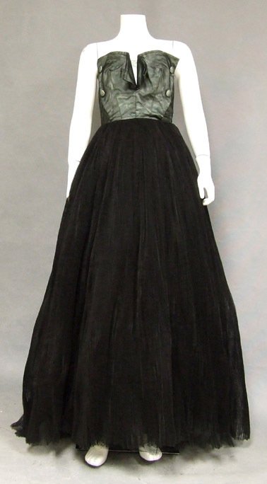 Sensational Silk & Tulle 1950s Strapless Ball Gown: A sensational 1950s ball gown in aqua silk satin and black tulle. This is clearly a fine piece though it has no label. Strapless, tuxedo style bodice with self fabric buttons. The center bust opens to