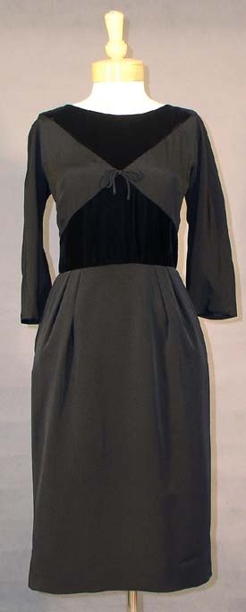 Ben Barrack 1950s Black Crepe & Velvet Cocktail Dress: An elegant little black dress in rayon crepe. Bodice is done in panels of crepe and plush black velvet. Dress has straight skirt with a short rear center seam slit. Dress is partially lined. Rear meta