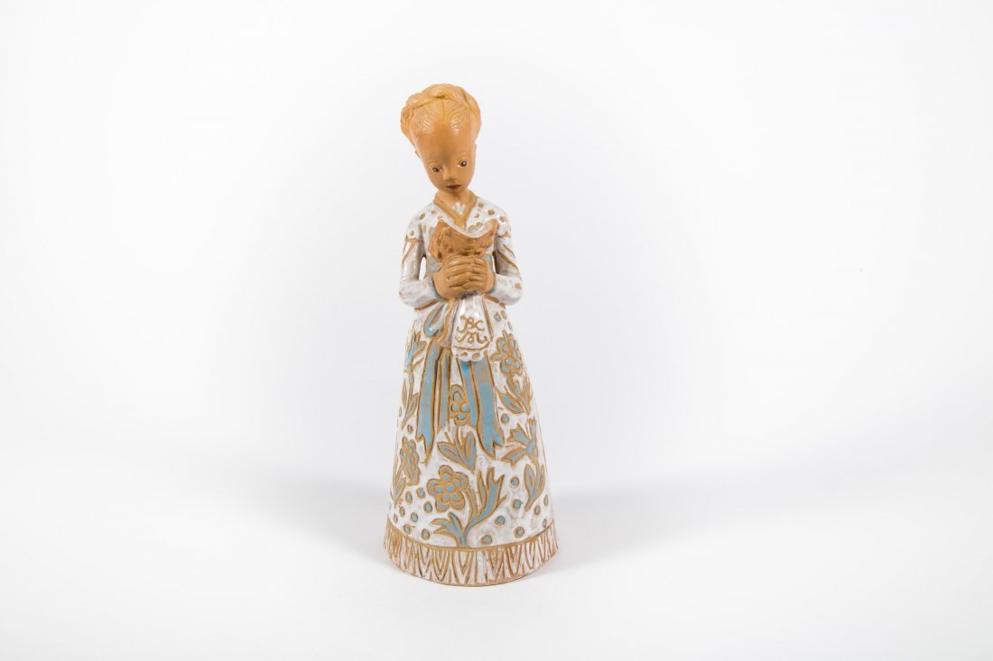 Kovacs Margit (1902-1977): Reading girl: Kovacs Margit (1902-1977): Reading girl; painted, glazed terracotta, signed on the scarf: KM, pressed into the mass: Made in Hungary; 33 cm