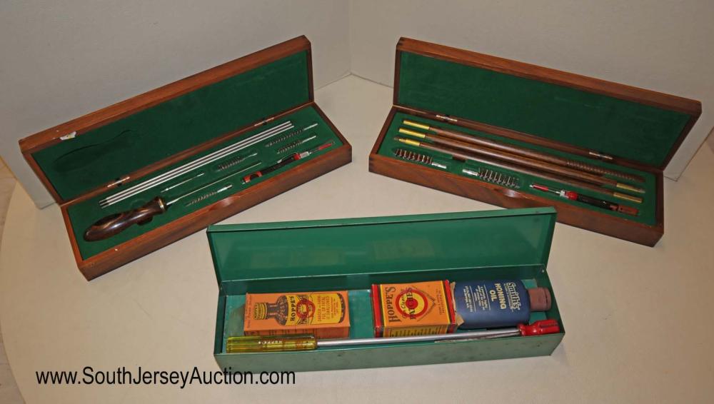 3 gun cleaning kits (2) pistol hard walnut cases dove: 3 gun cleaning kits (2) pistol hard walnut cases dove tailed boxes (1) metal case with Hoppes oil Dimensions: metal 15" l x 2" h x 4" d (2) walnut 14" l x 2" h x 4" d