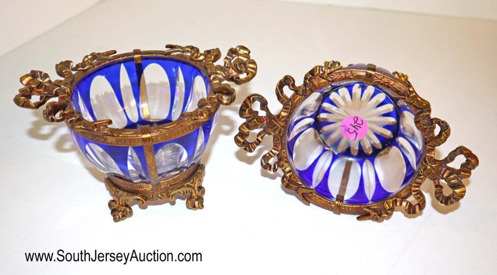PAIR of 19th Century leaded glass cut to clear bowl: PAIR of 19th Century leaded glass cut to clear bowl wrapped in bronze with double bow handles Dimensions: 3 1/2" h x 6" w