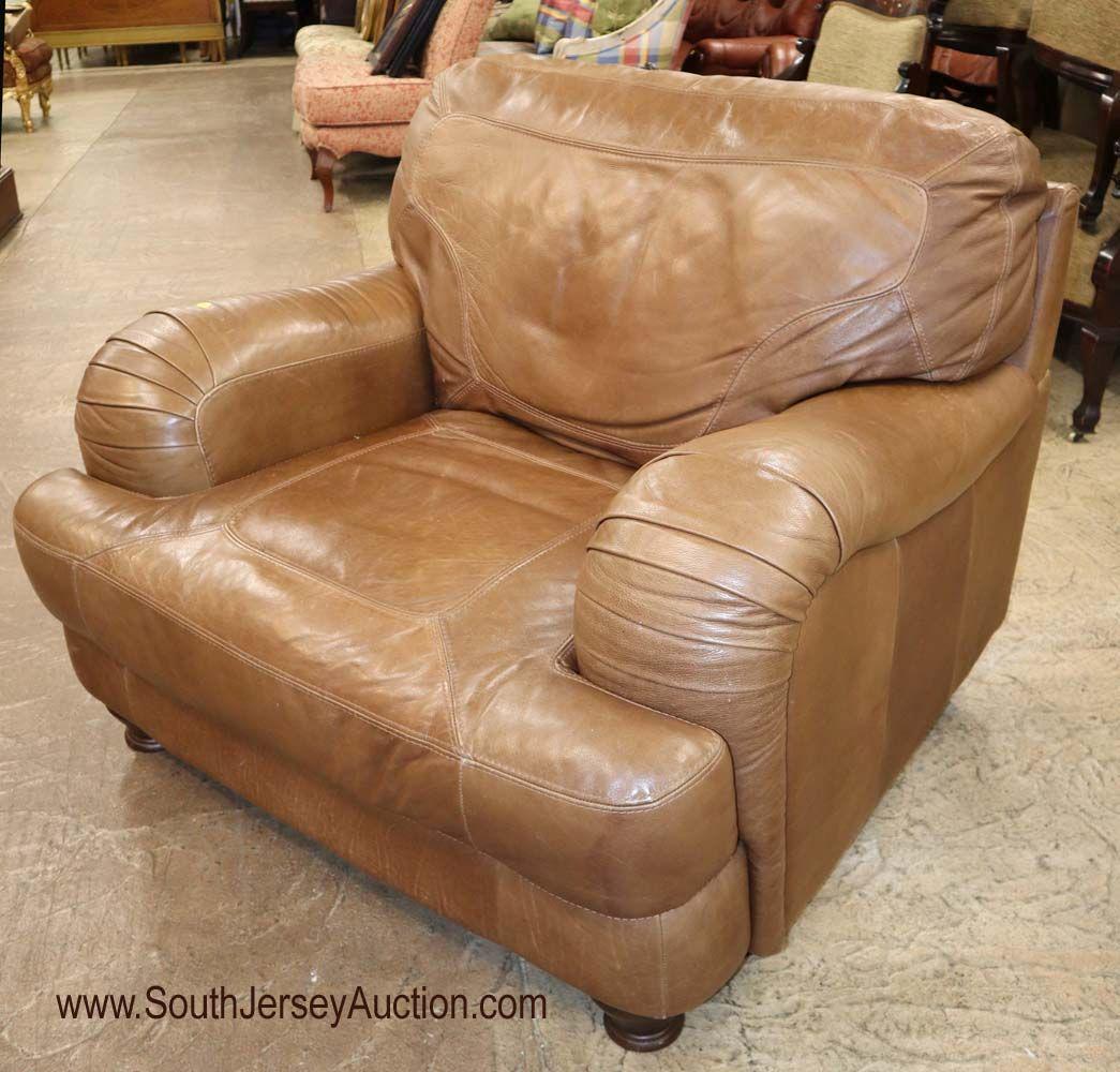 Light brown leather club chair: Light brown leather club chair Dimensions: 42" w x 42" d x 36" h