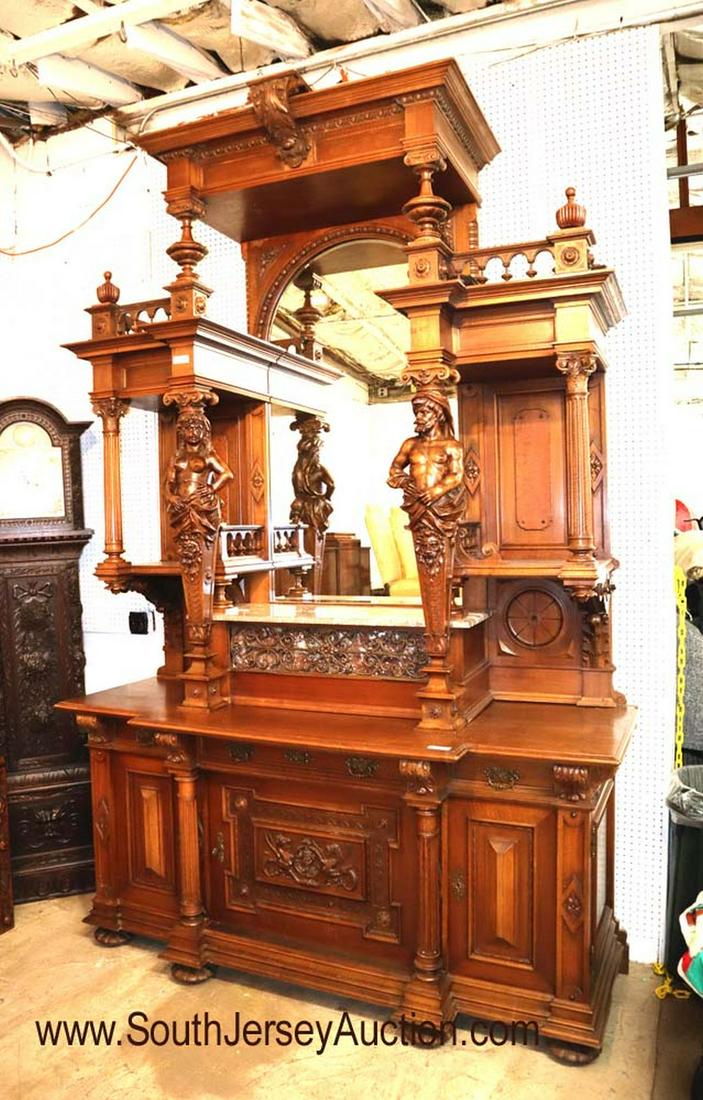 Monumental Antique Marble Top Buffet - manner of Horner: AWESOME Monumental ANTIQUE museum quality solid mahogany marble top buffet in the manner of Horner Furniture. Highly carved with full figure man, woman, and lion heads with iron inserted decorations. 