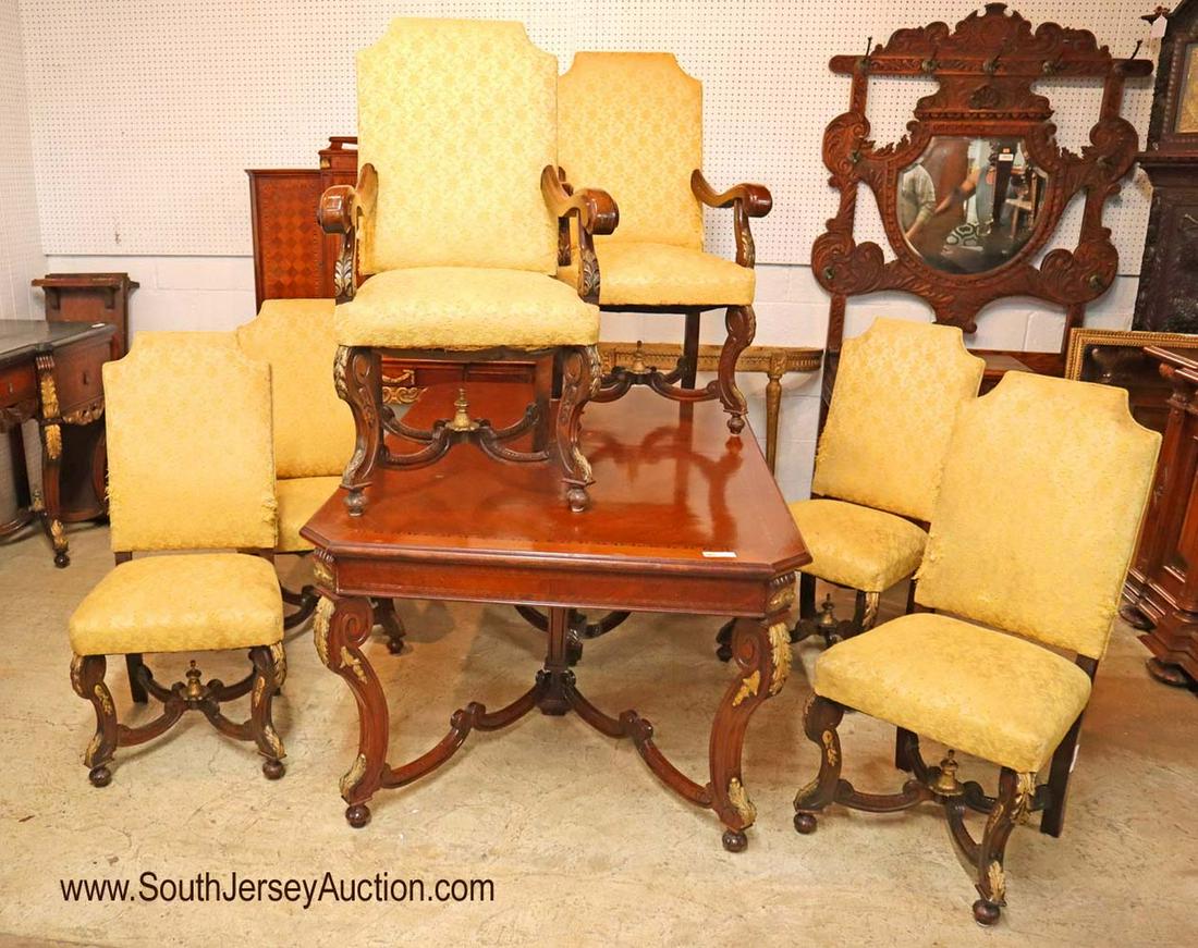 Antique 7pc French Style Dining Room Set: Antique 7 Piece Heavily Carved and Ornate French Style Dining Room Set,(Table with 6 Chairs)with parquet inlay table 69" l x 44" w x 31" h (2) 15" leaves arm chairs 26" w x 27" d x 45" h side chairs 2