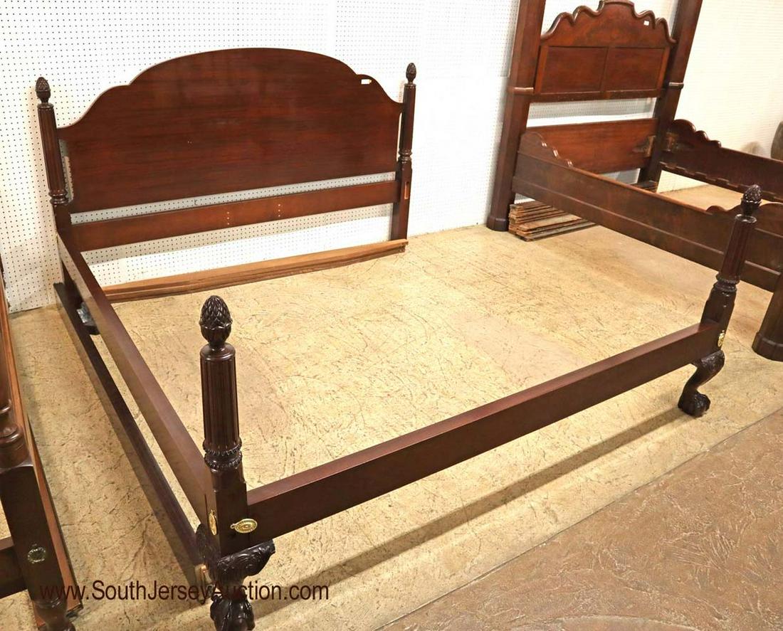 Quality Solid Mahogany King Size Bed attributed to: QUALITY solid mahogany king size bed attributed to Baker Furniture. Claw feet and carved pineapple posters. Has all rails, bolts, and mattress hangers. 85" w x 85" d x 49" h