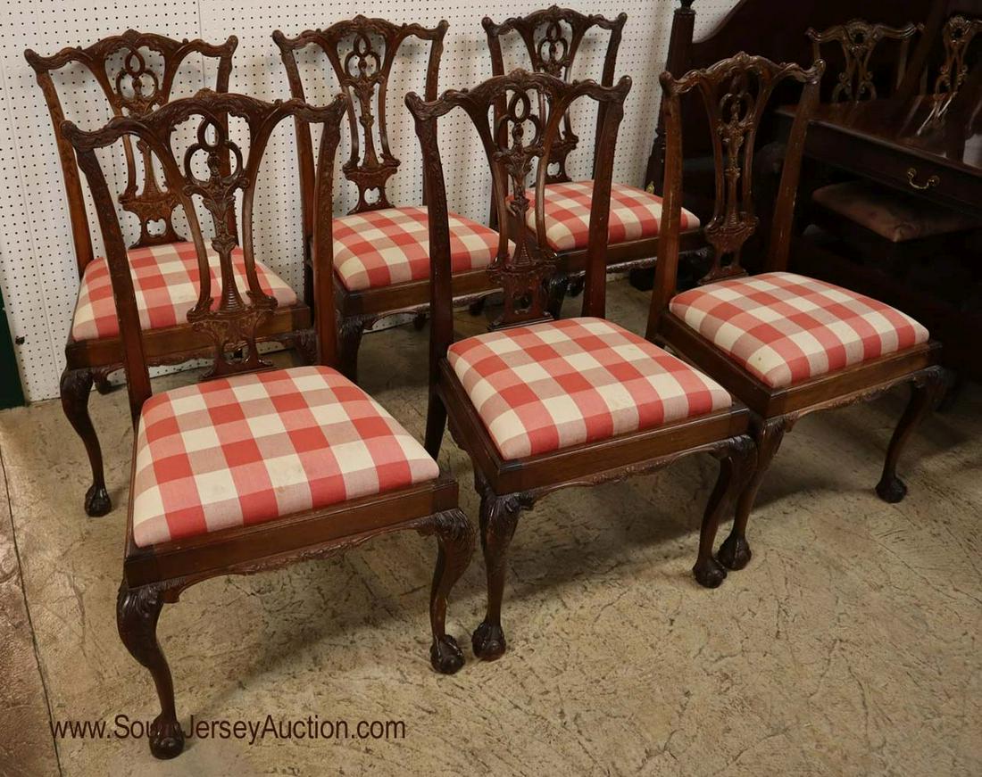 Set of 6 Mahogany Ball and Claw Dining Room Chairs: Set of 6 solid mahogany Chippendale style dining room side chairs with ball and claw feet and country plaid removable seats. 25" w x 22" d x 41" h
