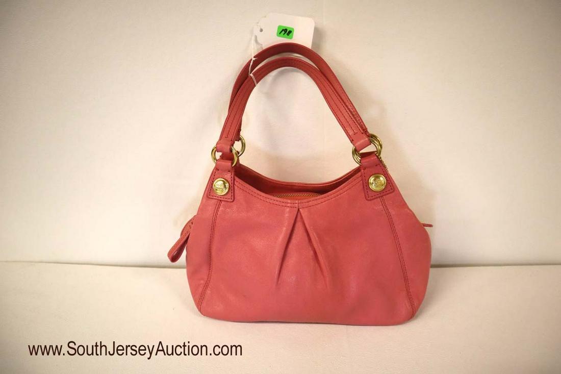 Coach #H1068-44322 in the leather pink double handle: Coach #H1068-44322 in the leather pink double handle handbag purse approx 10"w x 6"h and straps 10"