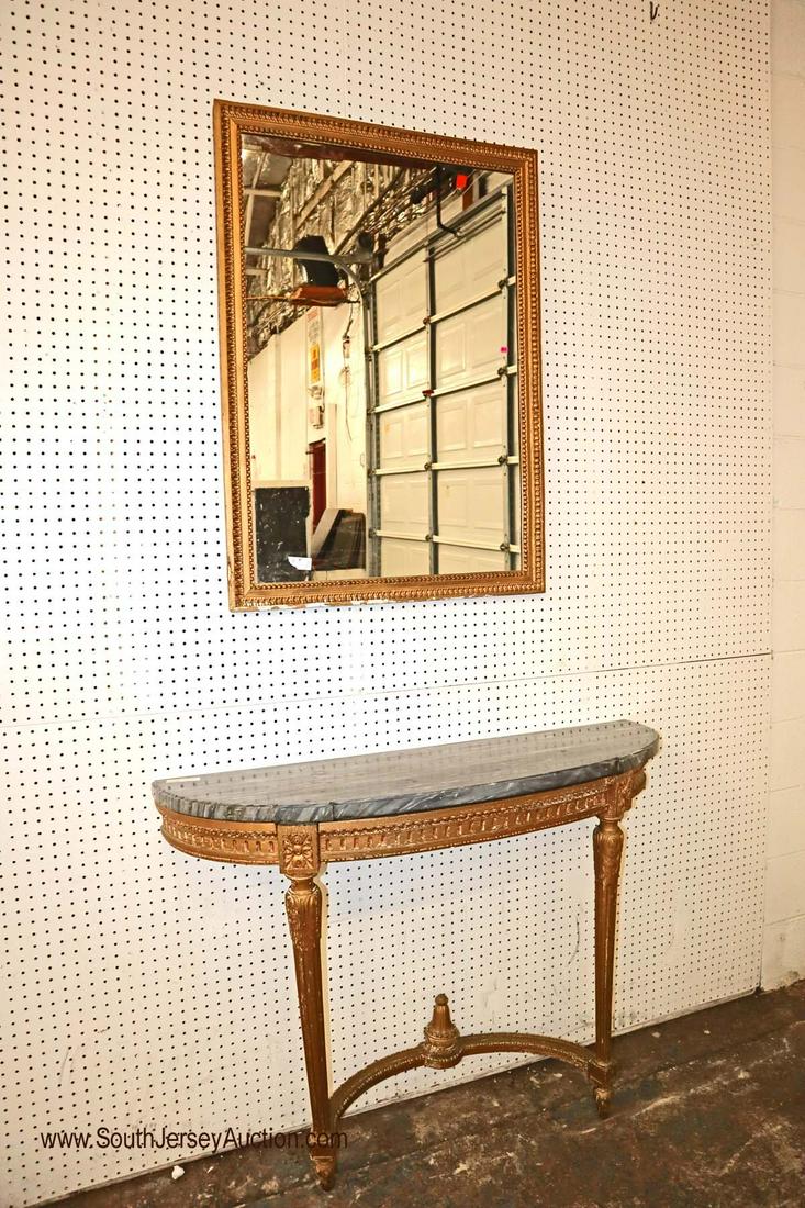 Antique French marble top gold guild console with: Antique French marble top gold guild console with mirror approx. Marble top: 46" w x 15" d x 36" h Mirror: 29" w x 40" h