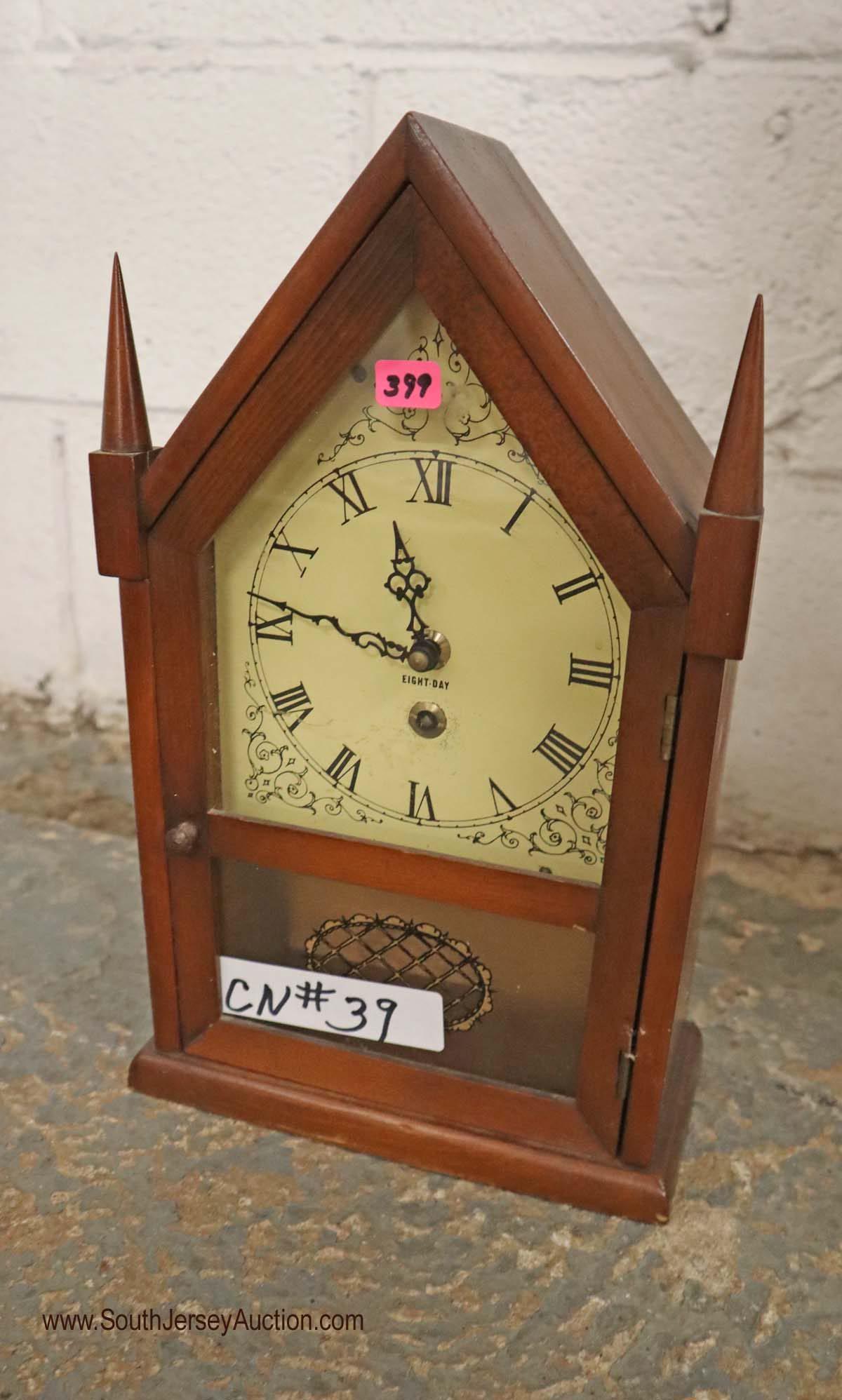 Antique style 8 day steeple clock approx. 8" w x 4" d x (1 of 2)