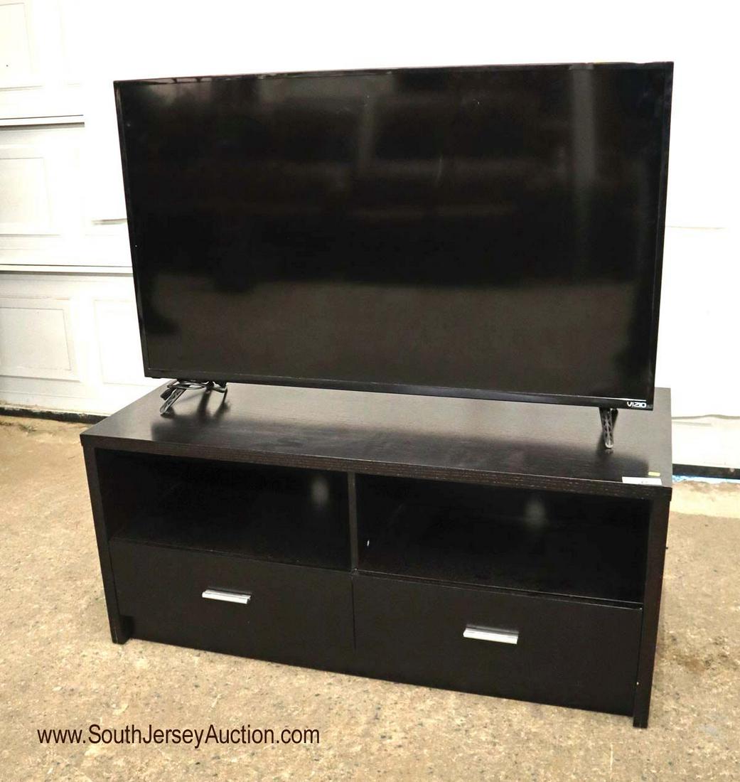 50" Visio flat screen TV, remote, on contemporary stand: 2 piece 50" Visio flat screen TV with remote on 2 drawer contemporary ebony finish entertainment/TV stand approx. TV: 50" screen TV Stand: 47 x 23 x 21