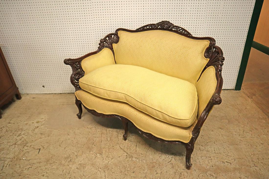 Beautiful Antique Ornate Down cushion Loveseat: Beautiful solid mahogany antique highly carved and ornate down cushioned love seat approx. 57" w x 32" d x 37" h