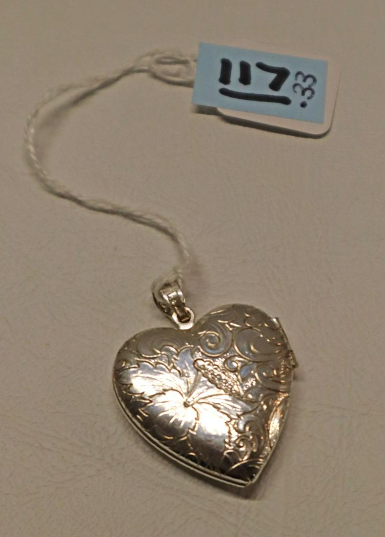 Silver heart shaped locket Total Weight: .33ozt: Silver heart shaped locket Total Weight: .33ozt