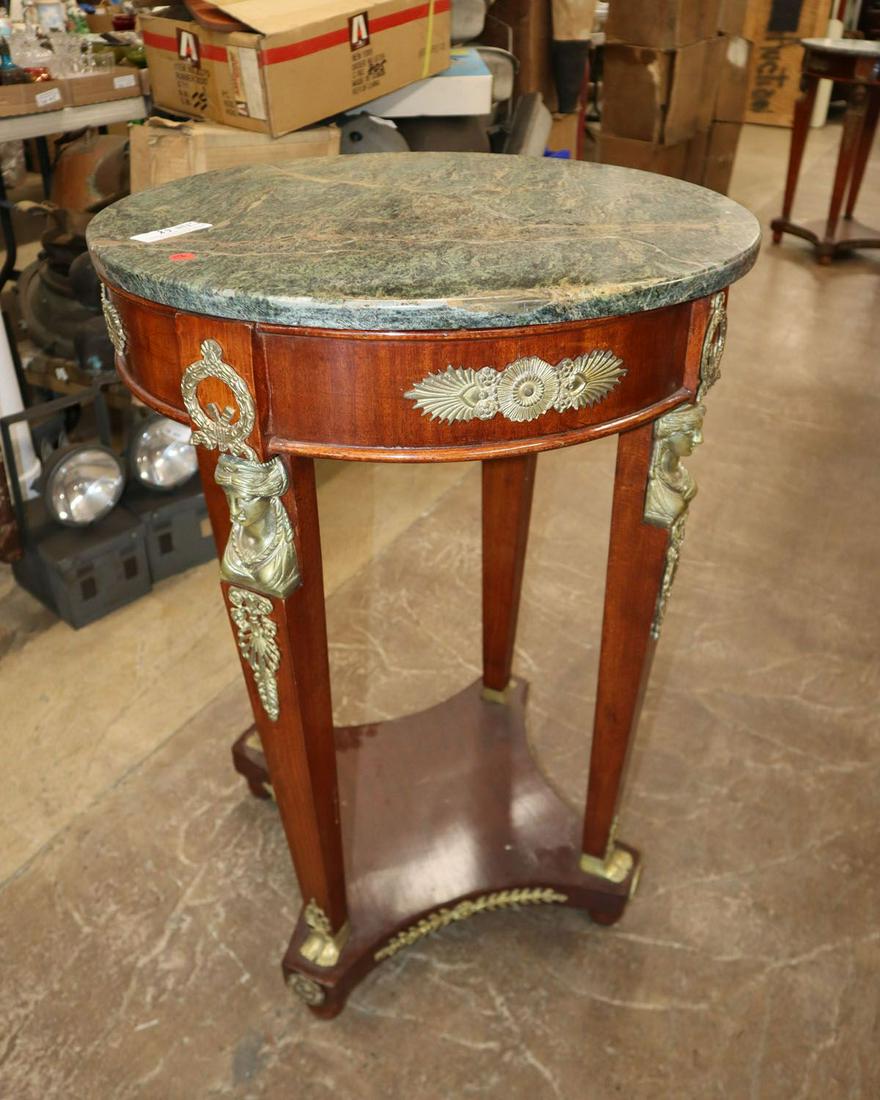 Marble top center table: Marble top center table with applied bronze approx. 23" diameter x 33" h