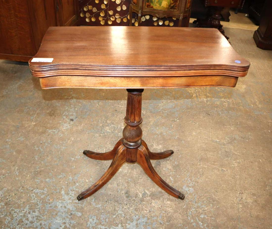 Duncan Phyfe style mahogany flip top game table: Duncan Phyfe style mahogany flip top game table approx. Closed: 29" w x 15" d x 30" h opens to 29" w x 29" d