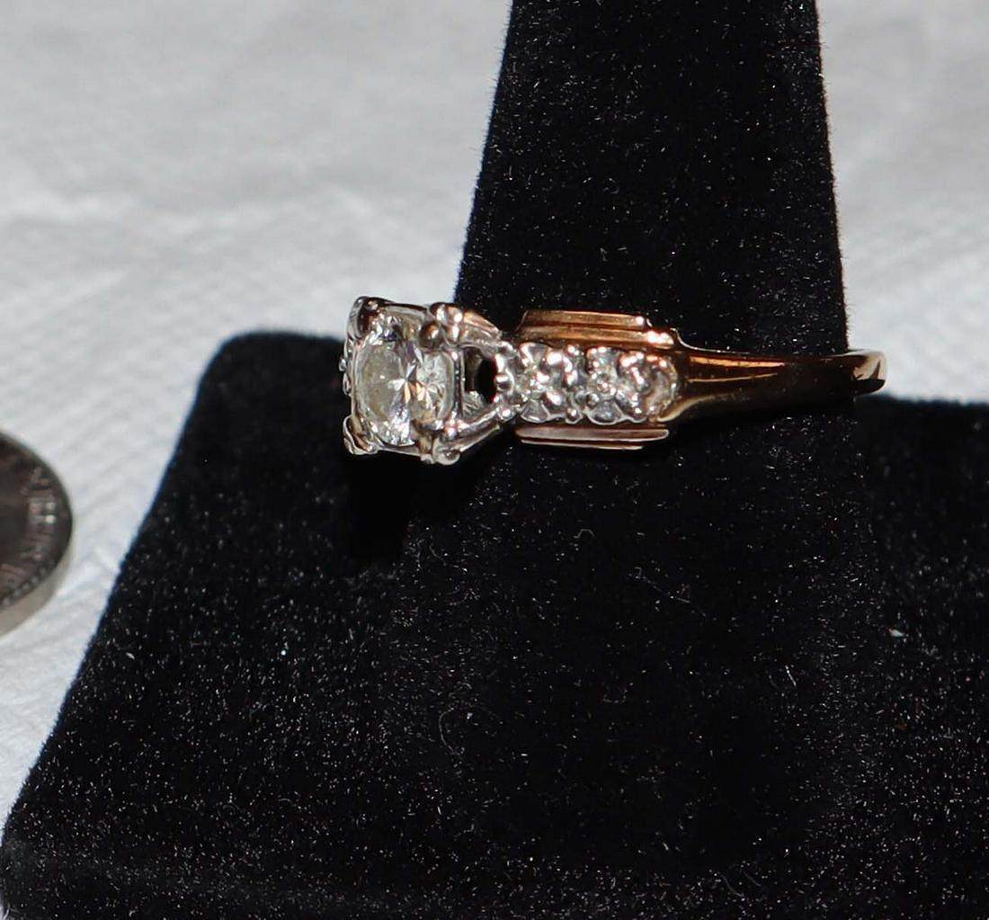 14K gold and diamond engagement ring: 14K gold and diamond engagement ring with center diamond being almost 1/2 CT size 7 1/4