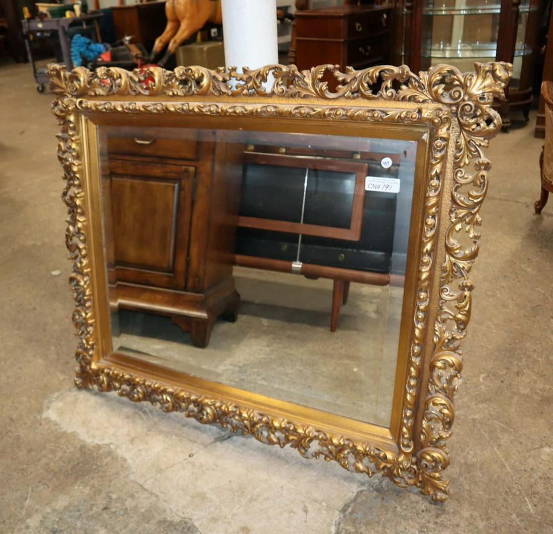 Antique pierced carved gold guild mirror: Fantastic antique highly pierced carved gold guild bevel glass mirror approx. 44" w x 36" h
