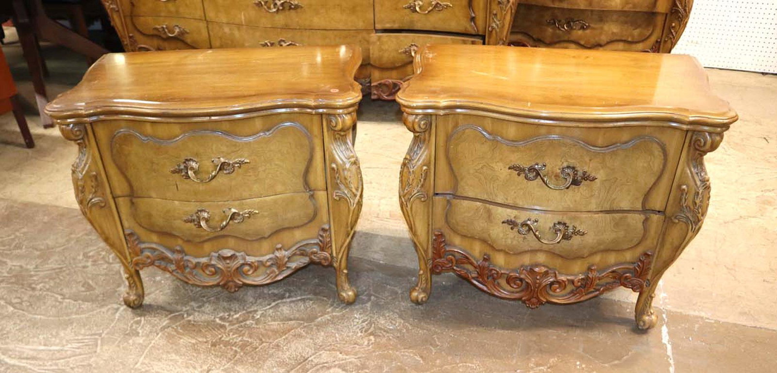PR Italian 2 drawer nightstands: Pair of Italian 2 drawer carved mahogany and walnut nightstands approx. 29" w x 17" d x 28" h