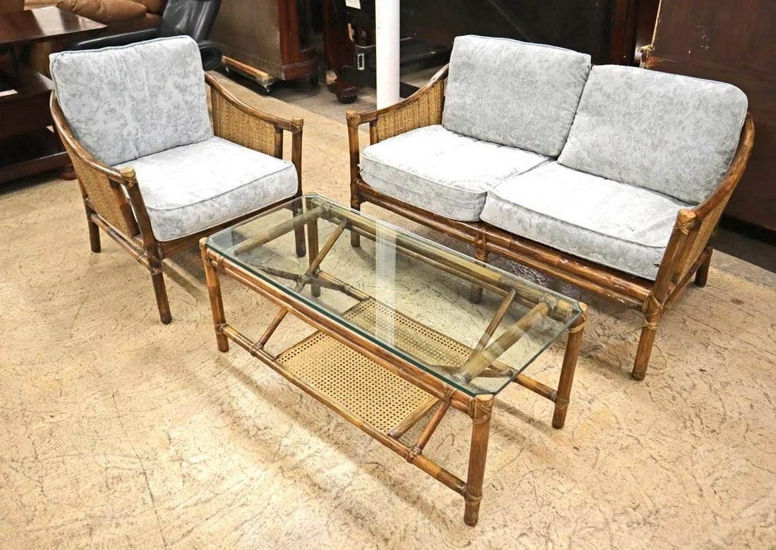 Vintage 3pc rattan porch/sun room lounge set: Vintage 3pc rattan and wicker porch/sun room lounge set approx. Loveseat: 51" w x 31" d x 29" h Chair: 28" w x 31" d x 29" h Table; 40" w x 18" d x 17" h