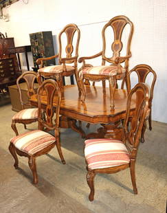 BEAUTIFUL Drexel Heritage 9pc dining room set: BEAUTIFUL Drexel Heritage 9pc dining room table in the burl walnut and oak banding with 8 chairs, 2 leaves, and custom table pads, all in very good condition approx. Table: 79" w x 49" d x 31" h Arm