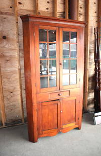 Antique solid cherry corner cabinet: Antique 1pc solid cherry 4 door 1 drawer corner cabinet with individual pane glass, made with square nails approx. 48" w x 24" d x 83" h