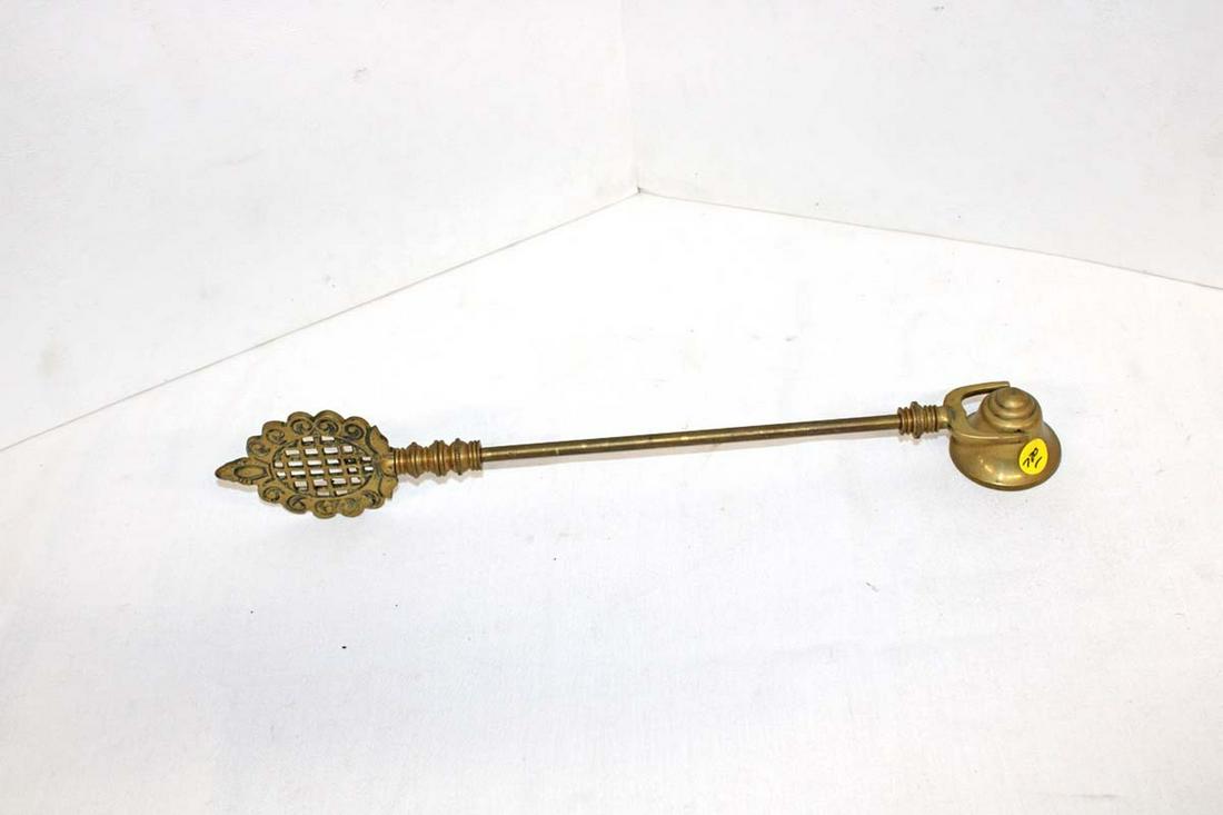 Asian brass candle snuffer (1 of 3)