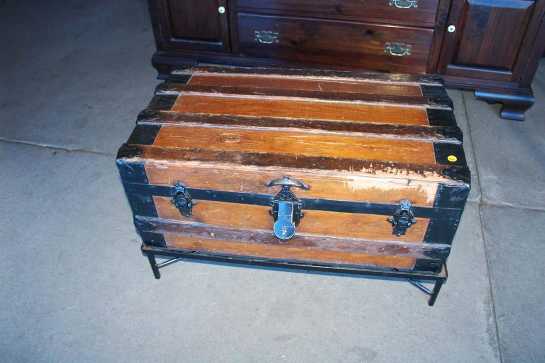 Antique trunk on metal stand, does have wear approx. 31" w x 18" d x 17" h (1 of 4)