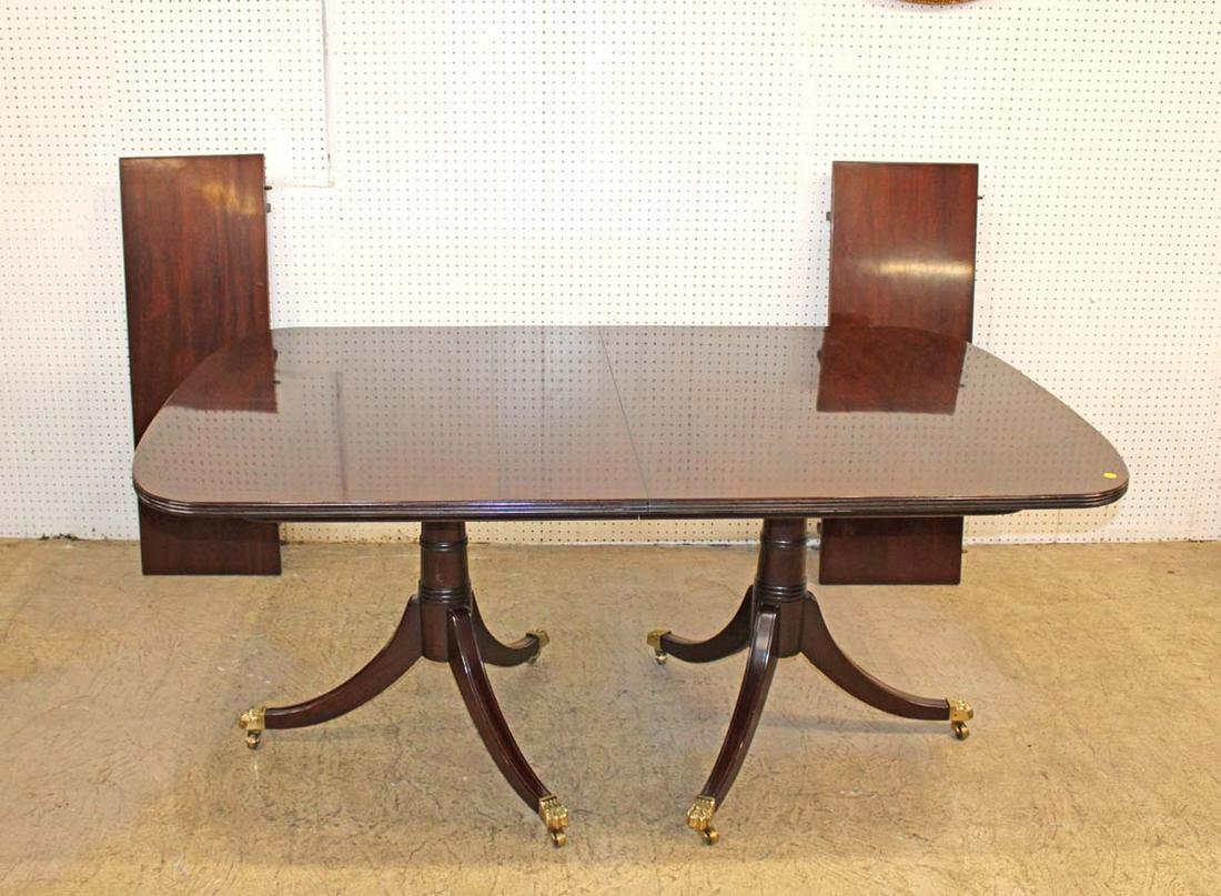 Stickley solid mahogany dining room table and 2 leaves approx. 68" w x 44" d x 30" h each leaf 15": Stickley solid mahogany dining room table and 2 (15") leaves approx. 68"l x 44"w x 30"h [68"l without the leaves] and [98"l with the leaves]
