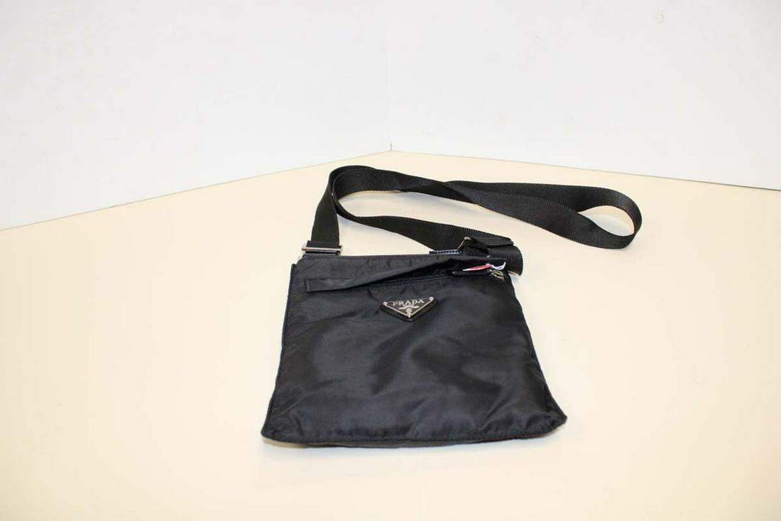 Black nylon marked Prada shoulder bag approx. 8" w x 2" d x 9" h adjustable strap (1 of 4)