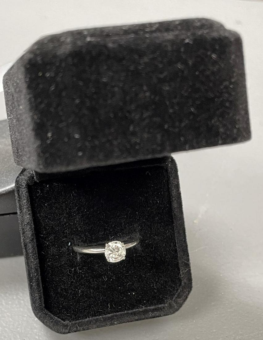 14K white gold ring with center stone, not a diamond approx. size 7 (1 of 4)