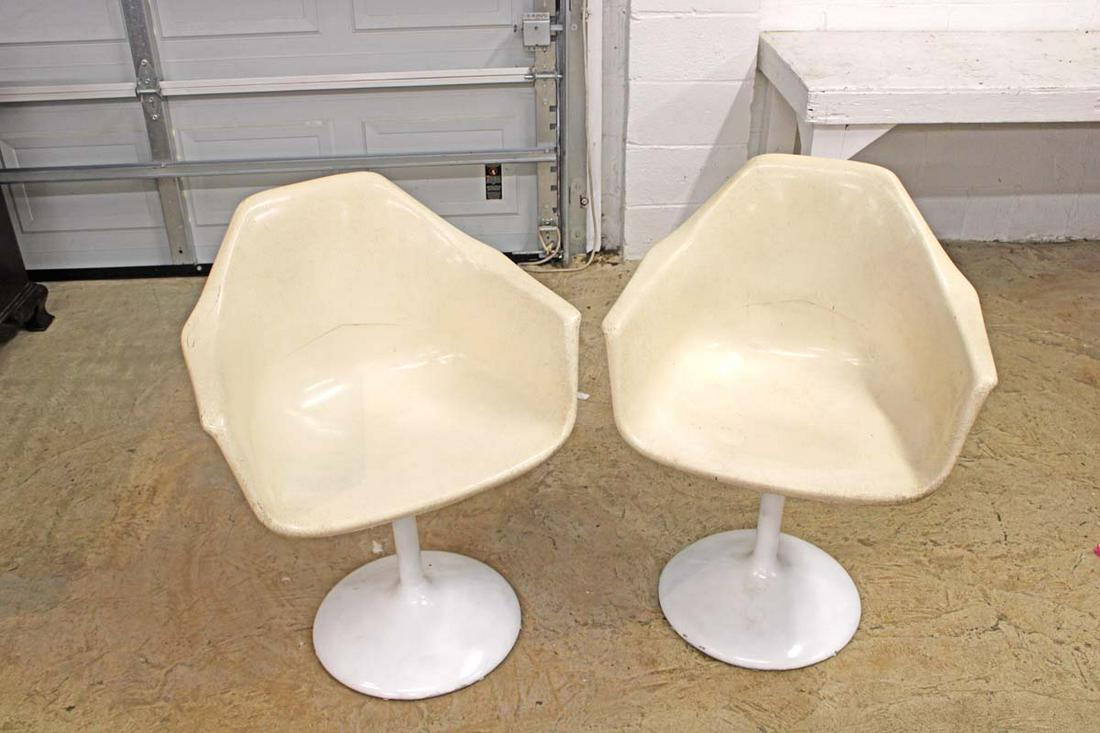 Pair Vintage modern style fiberglass swivel chairs on metal base in the manner of Herman Miller (1 of 3)